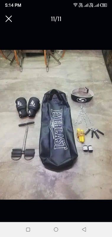 4 FEET EVERLAST BOXING BAG WITH GLOVES AND MANY MORE 1