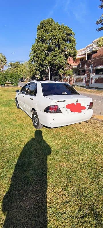 Mitsubishi Lancer 2005 file miss 4