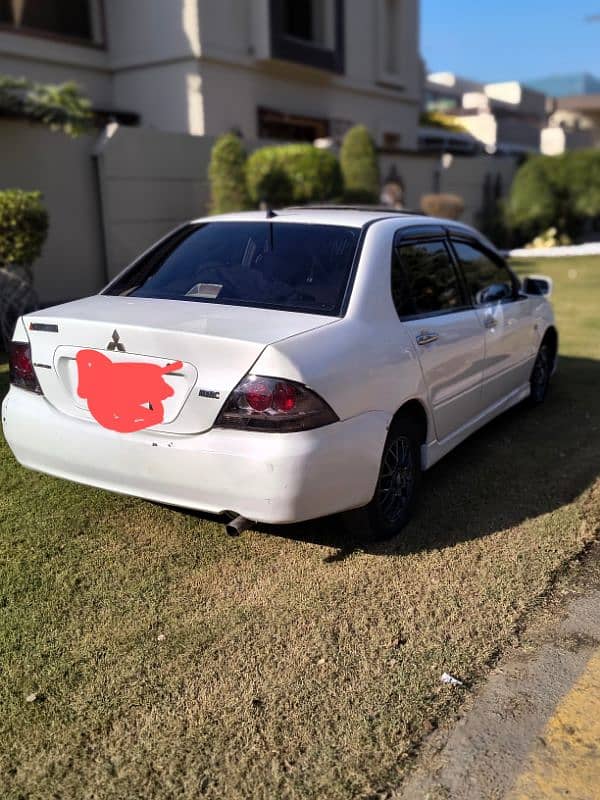 Mitsubishi Lancer 2005 file miss 6