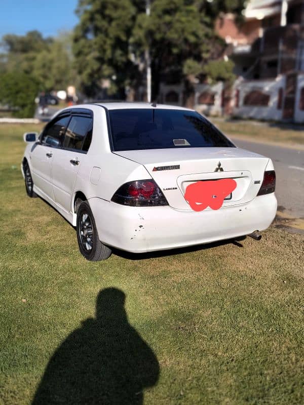 Mitsubishi Lancer 2005 file miss 7