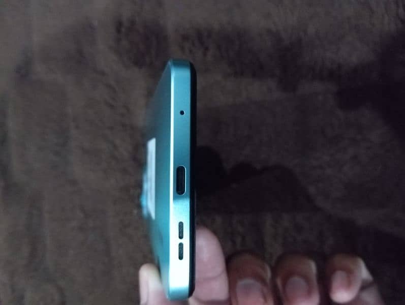 Redmi note 12(8+6/128). new condition,complte box charger,4mnth warenty 2