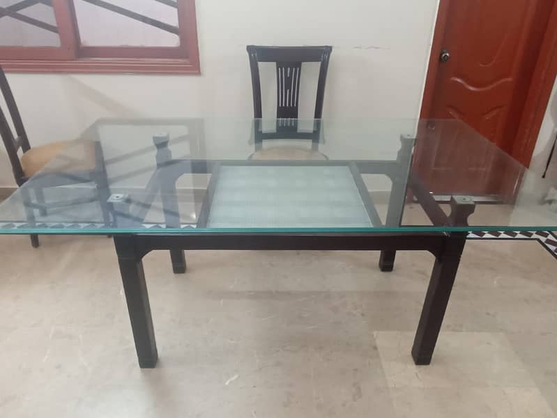 Glass top dining table (6 chairs) 1