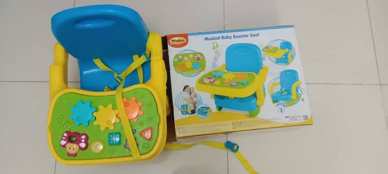 Unused Winfun musical baby booster seat 1