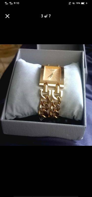 Guess Gold stainless brand 3