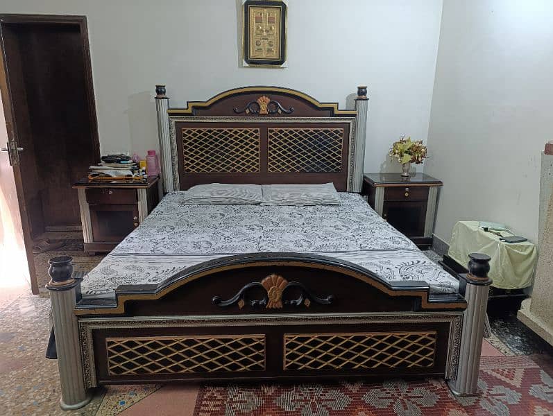 wooden bed with 2 side tables without mattress 0