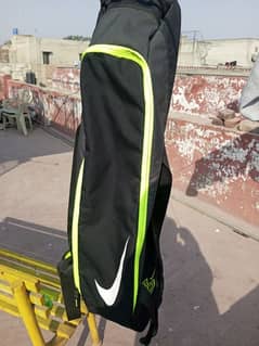 Nike cricket bat and ball bag.