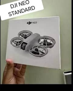 Dji neo standard brand new warranty Box Open only