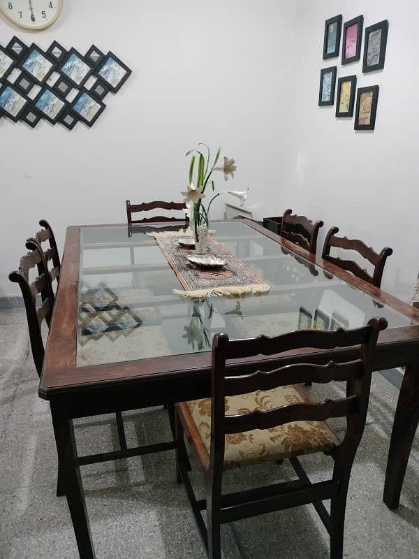 Wooden Dinning table and chairs 0