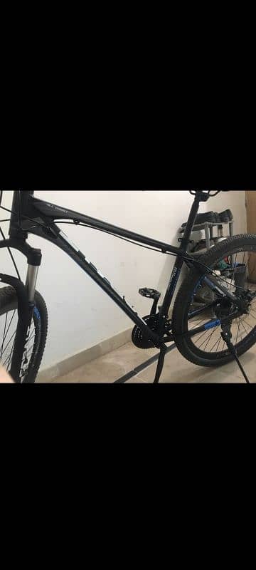 I AM SELLING MY COBALT  INPORTED MOUNTAIN BICYCLE 0