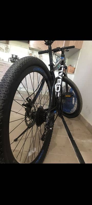 I AM SELLING MY COBALT  INPORTED MOUNTAIN BICYCLE 1