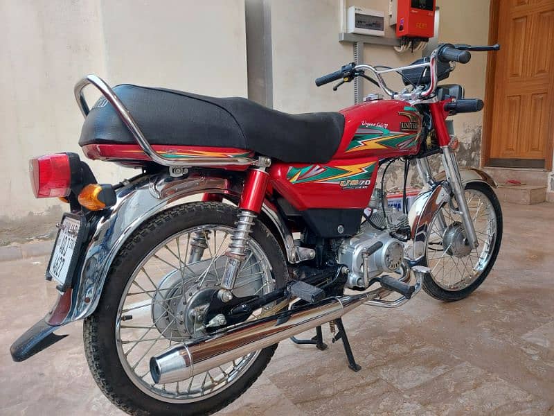 united 70 cc red bike 4