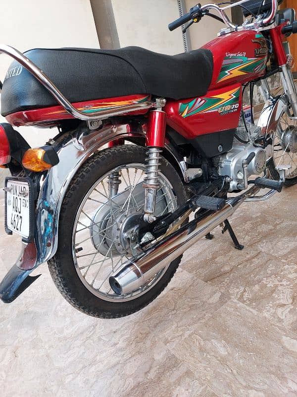 united 70 cc red bike 5