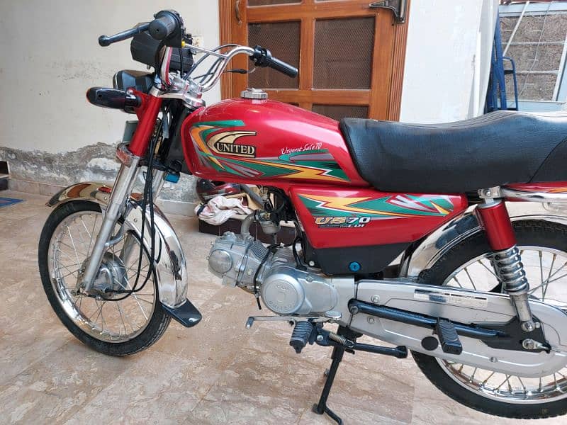 united 70 cc red bike 7