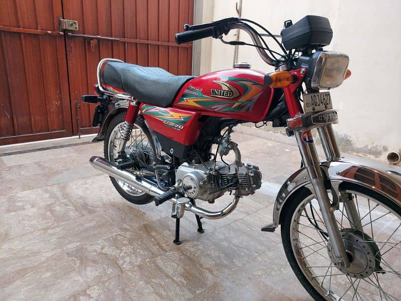 united 70 cc red bike 9