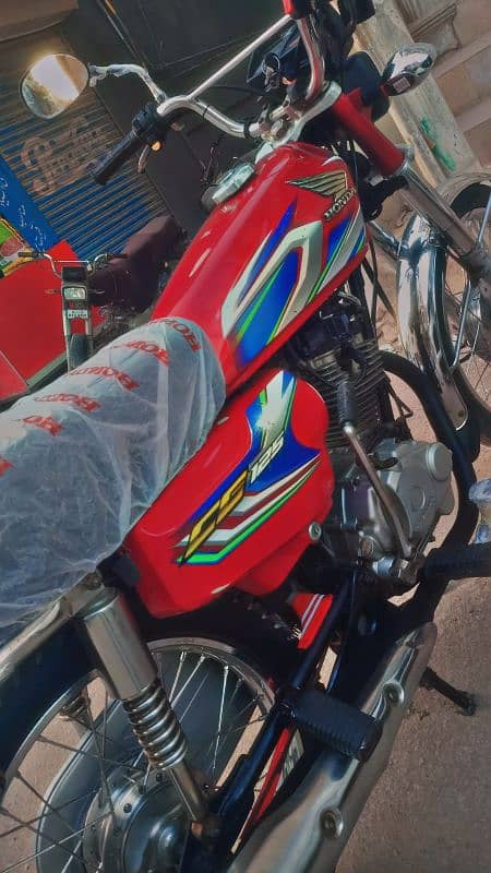 Honda125 Karachi number  all ok zada used nhi howe contact 03194725877 6