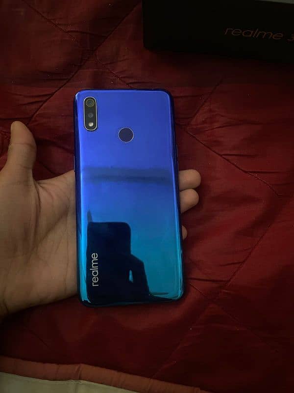 realme 3 4 64 gb 0