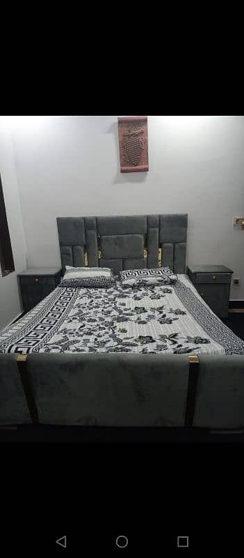 Double bed with side table and dressing