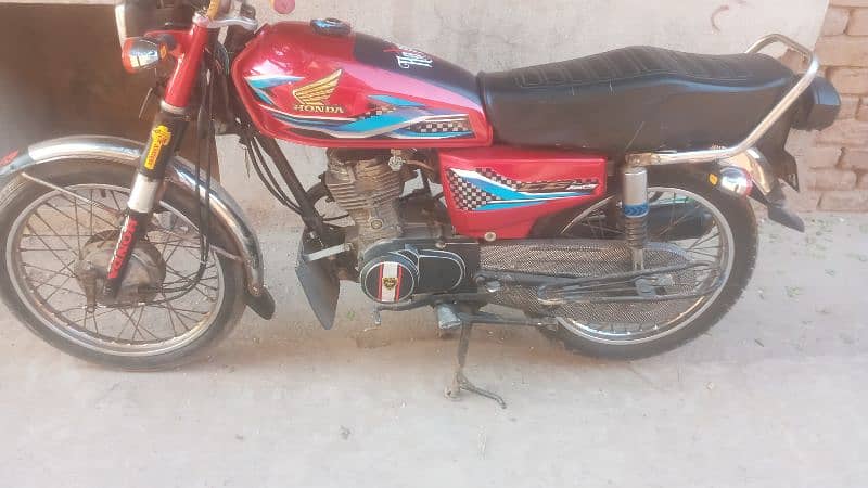 Honda cg 125 faisalabad number all ok  dacomant 0