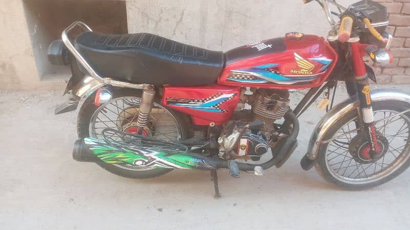 Honda cg 125 faisalabad number all ok  dacomant 7