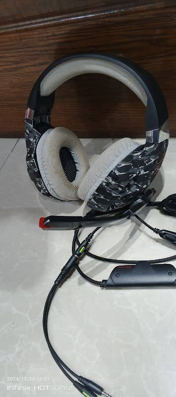 Onikuma K2 wired headphones for sale. 8 months used. Condition is A1 1