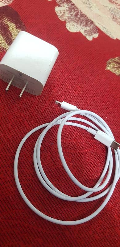 iPhone original chager and copy cable uk pin 1