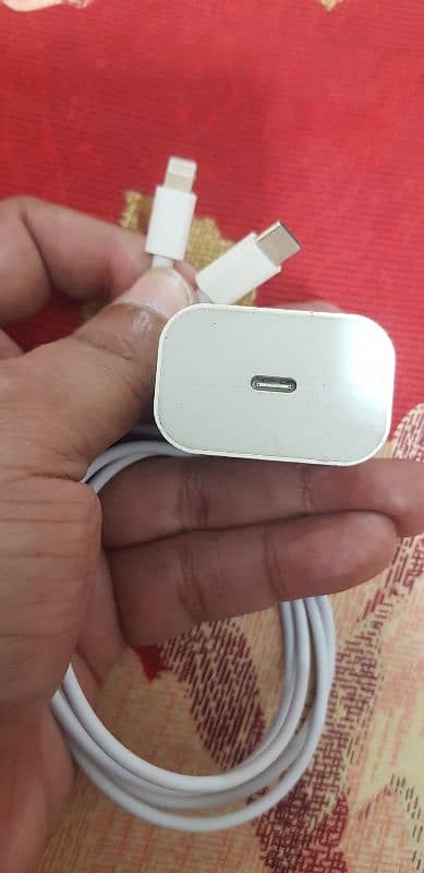 iPhone original chager and copy cable uk pin 2