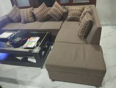 L shaped sofa for sale, good condition brown pattern color