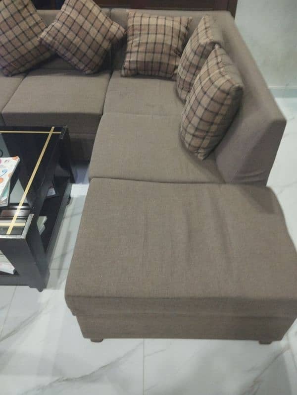 L shaped sofa for sale, good condition brown pattern color 1