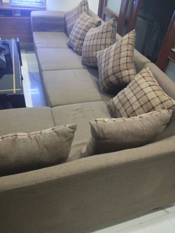 L shaped sofa for sale, good condition brown pattern color 2