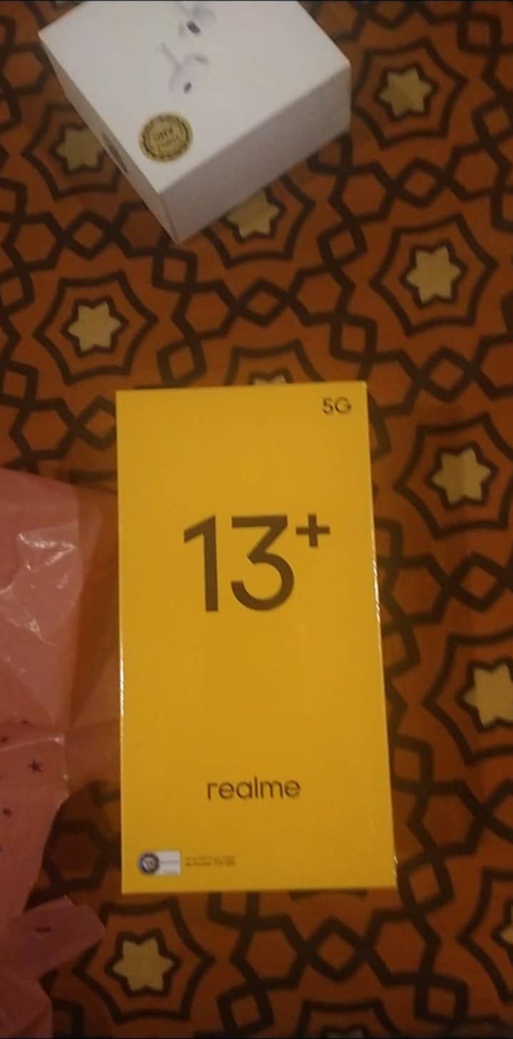 Brand new Realme 13 + 5G, unused, brand new. 0