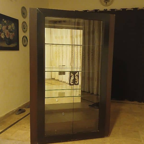 WODDEN AND GLASS WARDROBE 0