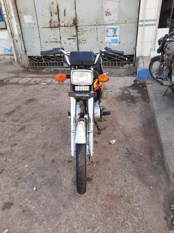 i m selling Honda CG125 bike own my name 8