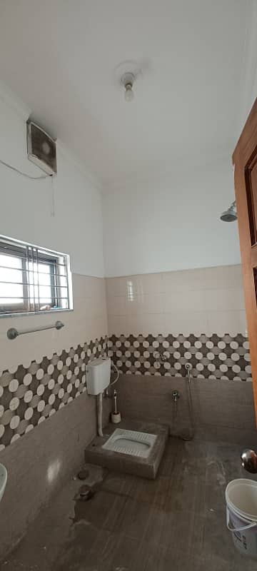 10marla 3beds DD TV lounge kitchen attached baths neat clean ground portion for rent in G 13 4 islamabad 1