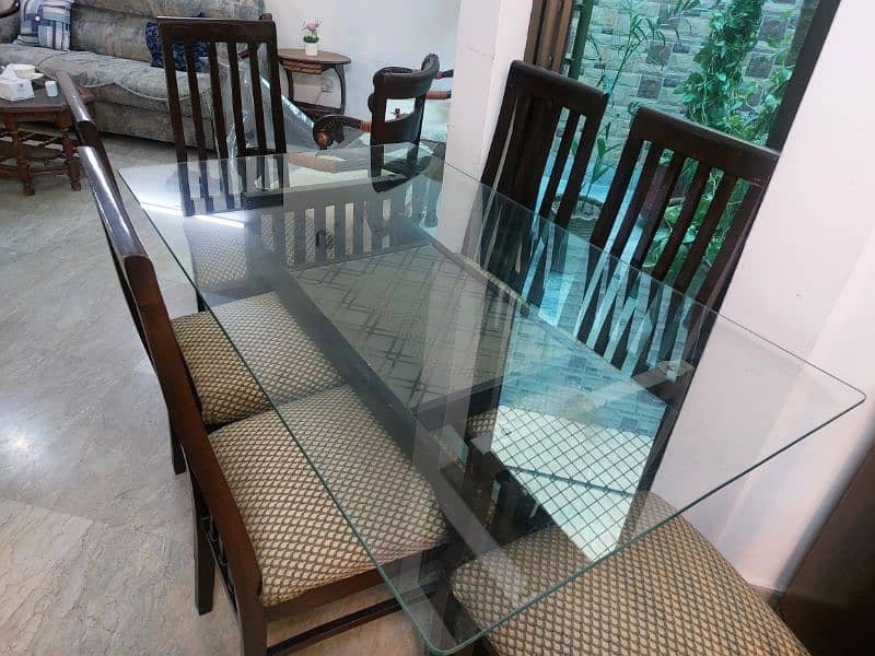 Wooden dining table with 6  chairs for sale 2