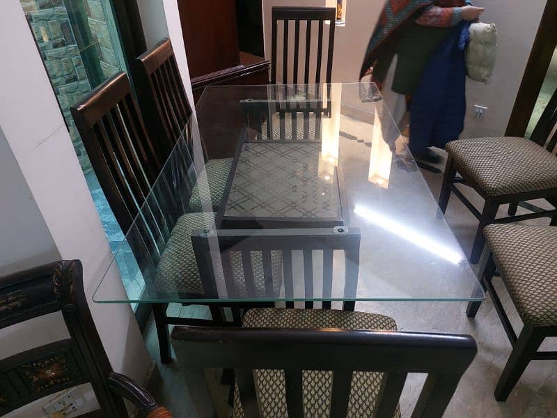 Wooden dining table with 6  chairs for sale 4