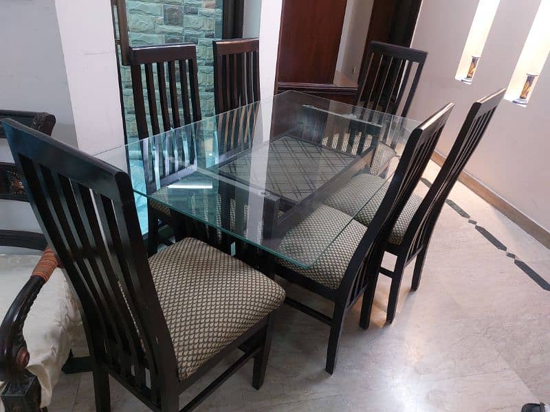 Wooden dining table with 6  chairs for sale 5