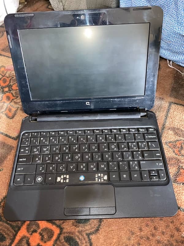 Hp compac laptop for sell  1gb 120gb with charger 8