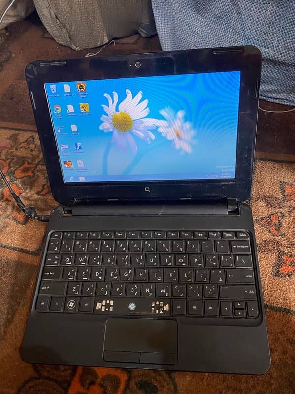 Hp compac laptop for sell  1gb 120gb with charger 11