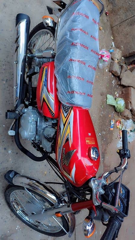 Honda 125 applied 4 open letter hai jobi lega first owner hoga 5