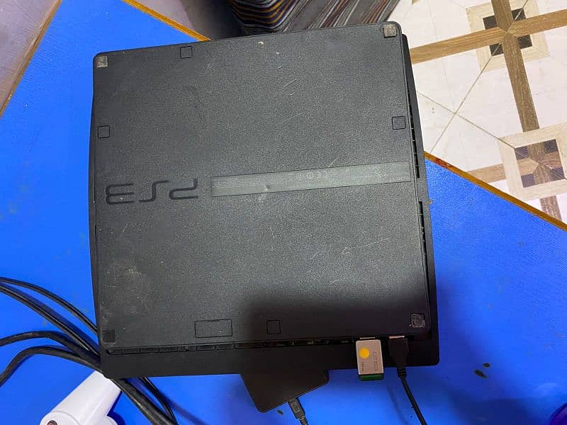 PlayStation 3 Slim jail break 500gb with two original controller 2