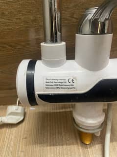 Instant electric heating water tap.