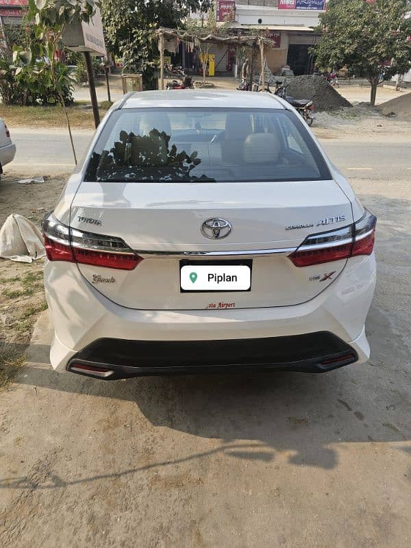 Toyota Altis Grande 2024 biege Room 9