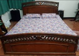 King size wooden bed with mattress