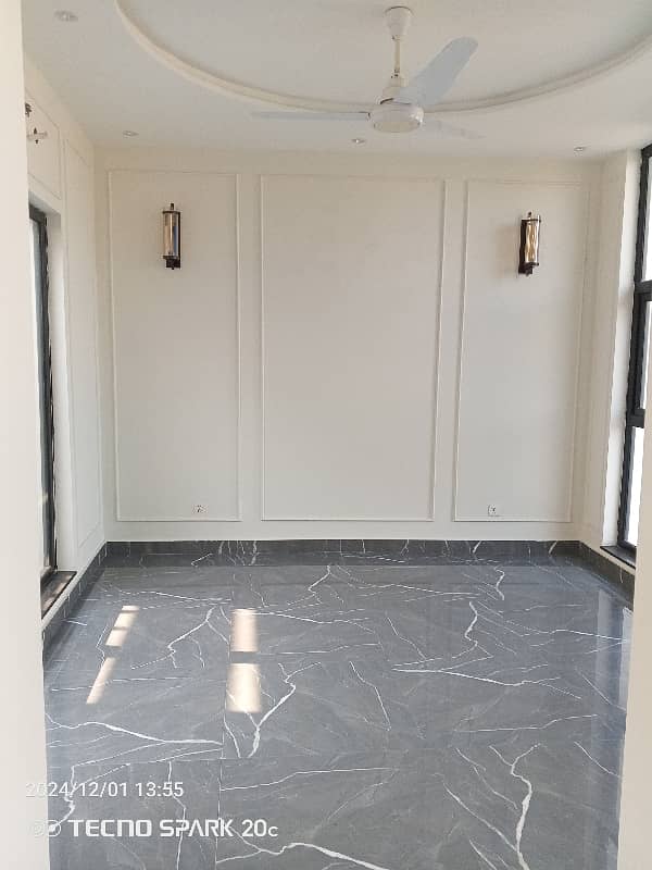 10 Marla well maintained Owner build modern Desighn house Available For Rent in DHA phase 2 Near Allama Iqbal International Airport and Ring Road Lahore 18