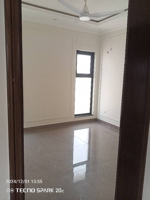 10 Marla well maintained Owner build modern Desighn house Available For Rent in DHA phase 2 Near Allama Iqbal International Airport and Ring Road Lahore 21