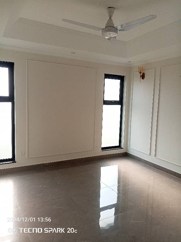 10 Marla well maintained Owner build modern Desighn house Available For Rent in DHA phase 2 Near Allama Iqbal International Airport and Ring Road Lahore 23