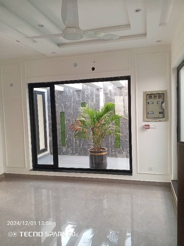 10 Marla well maintained Owner build modern Desighn house Available For Rent in DHA phase 2 Near Allama Iqbal International Airport and Ring Road Lahore 26