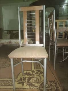 6 steel iron chairs and steel iron dining table