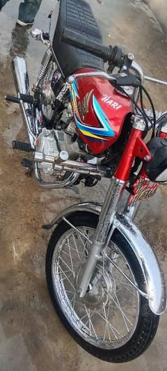 Honda 125 golden number Akk 202 with golden serial number 786