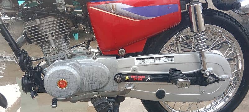 Honda 125 golden number Akk 202 with golden serial number 786 3